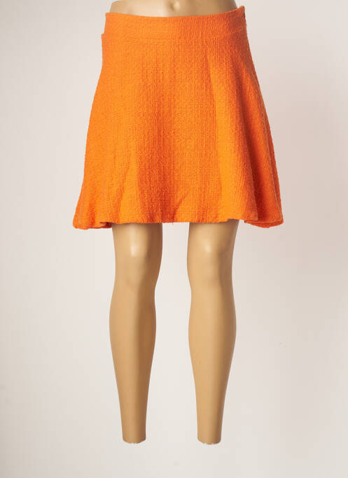 Fustă scurtă portocaliu TENSIONE IN femeie
